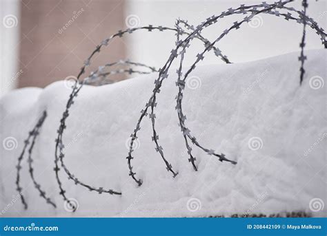 Barbed Wire Covered With Snow Industrial Landscape Background Stock