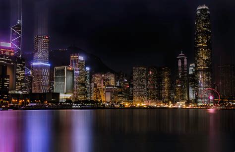 Cityscape By Water During Nighttime Hd Wallpaper Wallpaper Flare