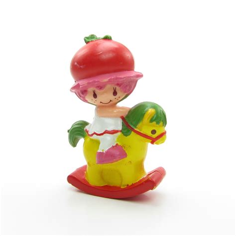 Cherry Cuddler On A Rocking Horse Miniature Figurine Brown Eyed Rose