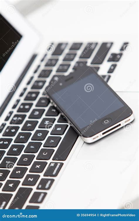 Cell Phone And Laptop Computer Editorial Stock Image Image Of