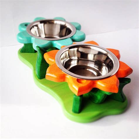 From the dazzling bluebells that cover ancient woodland in the spring to the bright meadows bursting with buttercups in the summer, wild flowers are what make our woods so beautiful, while providing. Pet bowl stand ZINNIA II S, Flower shape pet bowl feeder ...