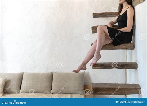 Woman Sitting On Stairs And Resting At Home Stock Image Image Of Calm