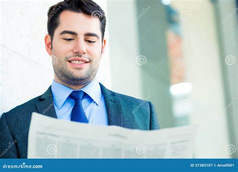 Businessman Reading Business Newspaper Stock Image Image Of Handsome