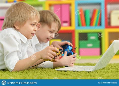 Portrait Of Two Boys Playing Computer Games Stock Photo Image Of Life