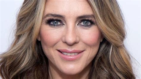 Elizabeth Hurley Showcases Never Ending Legs In Figure Hugging Dress In