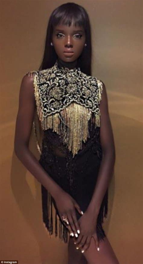twitter users confuse model duckie thot with a doll daily mail online model beautiful black