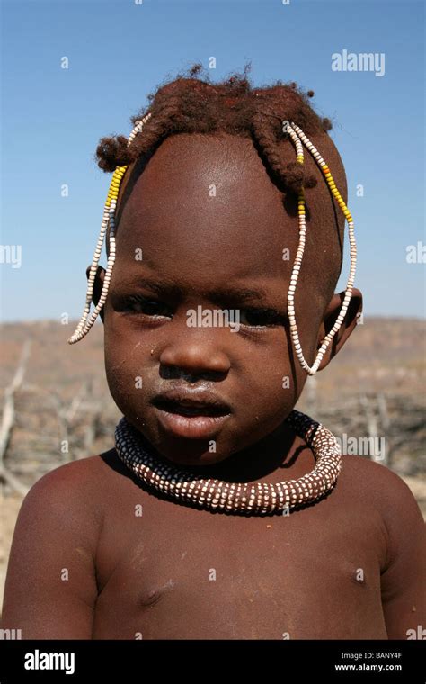 Portrait Of Smiling Young Himba Tribe Boy Taken Nr Kunene River