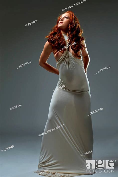 Sexy Woman Posing With Naked Breasts In Long Dress Stock Photo