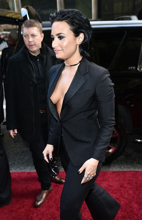 PICS Demi Lovatos Cleavage Pop Star Goes Braless In Dangerously Low Blazer Hollywood Life