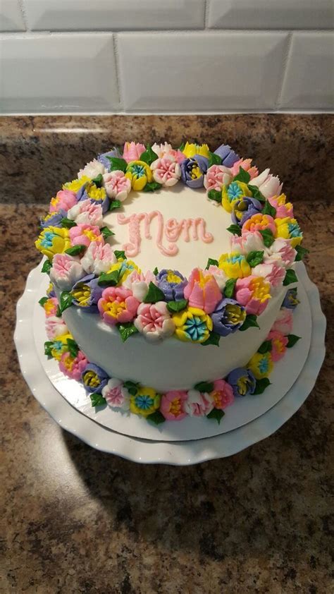 The vine and scroll pipings are buttercream too with fondant pink and purple flowers. Russian Piping Tip Mother's Day Cake | Russian cake ...