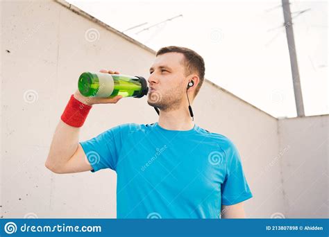 Caucasian Man Drinking Water During Exercises Stock Photo Image Of