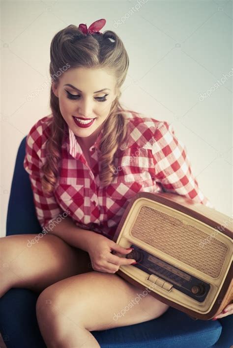 Pin Up Girl Using Retro Radio Stock Photo By ©gpointstudio 110298666