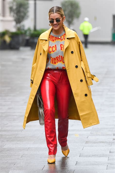 Ashley Roberts In A Yellow Trench Coat And Red Pvc Trousers London 12