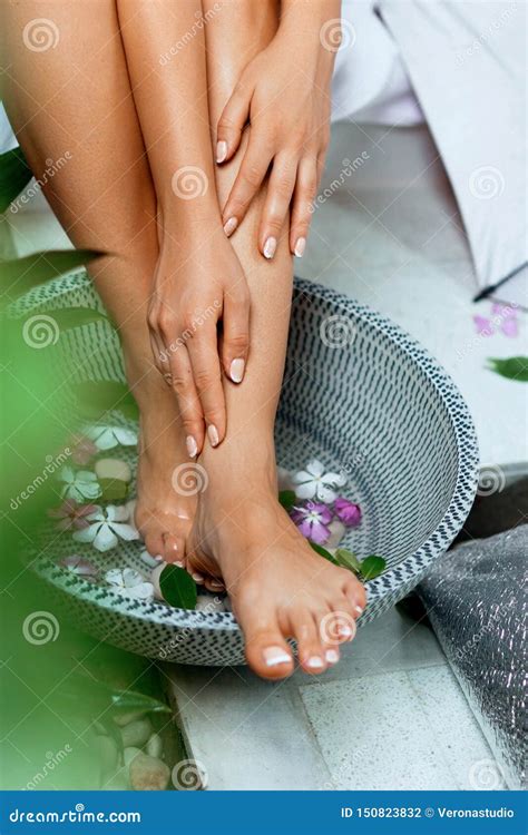 Beauty Spa Treatment And Product For Woman Feet And Foot Spa Foot Bath In Bowl With Tropical