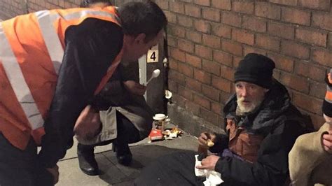 Person Helping Homeless
