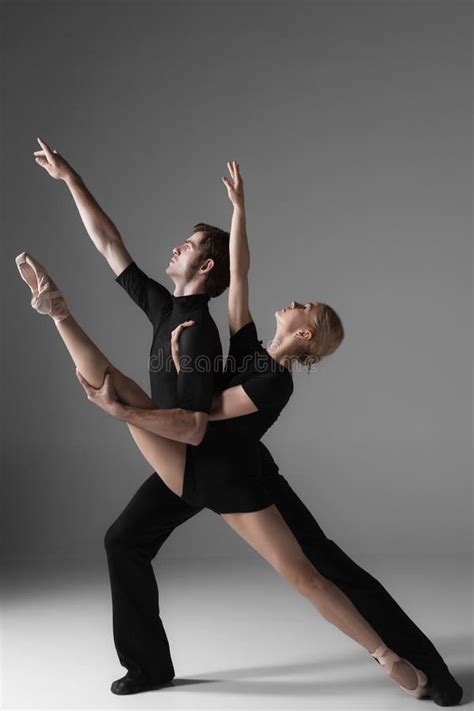 Two Young Modern Ballet Dancers On Gray Studio Stock Photo Image Of