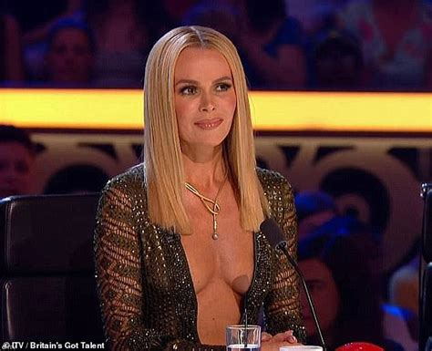 Britain s Got Talent judge Amanda Holden wears risqué dress with spider web over her boob