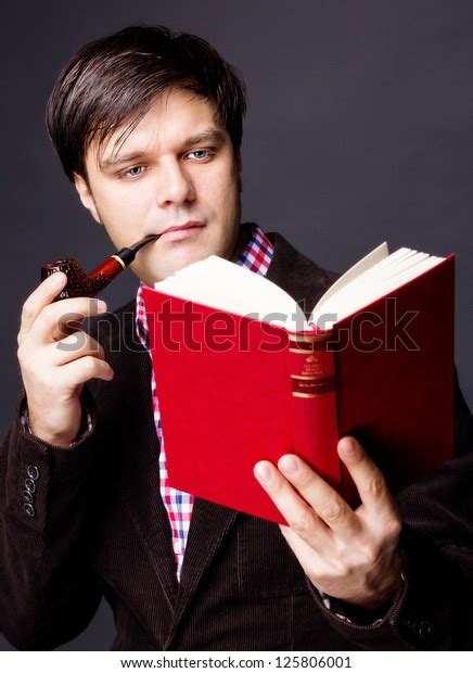 Portrait Man Smoking Pipe While Reading Stock Photo 125806001