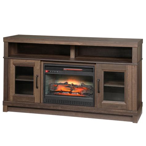 Crafted from metal, in a black finish, and glass, it can be plugged in and used electricity as a fuel type. Home Decorators Collection Fireplace Ashmont Freestanding ...
