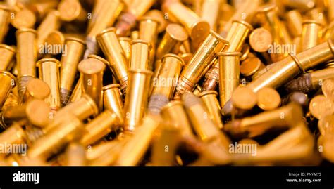 Cylindrical Golden Bullets In A Pile Stock Photo Alamy