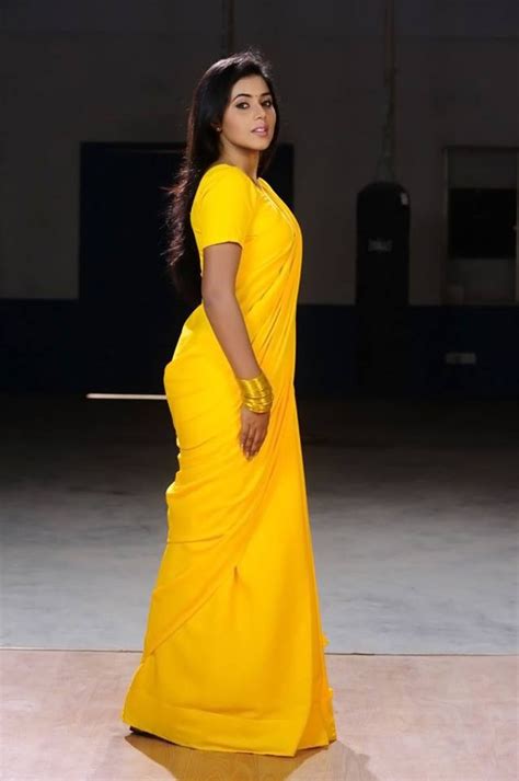 poorna hot in yellow solid saree with matching blouse looking sexy seducing