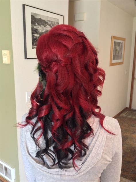 This red and black hair color can be worn on all types of hair. Waterfall braid, bright red with black underneath | Black ...
