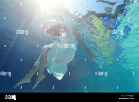 Young Women Under The Water Stock Photo Alamy