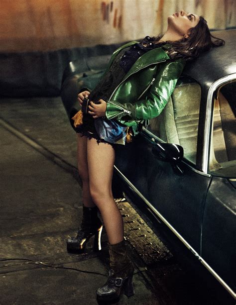 Celebrities Corner Mila Kunis Bends Over The Hood Of A Car