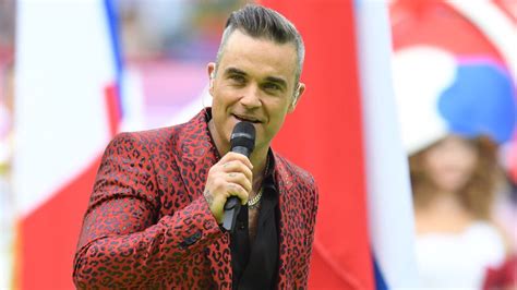 Robbie Williams Has So Much Hair In His Latest Throwback Photo