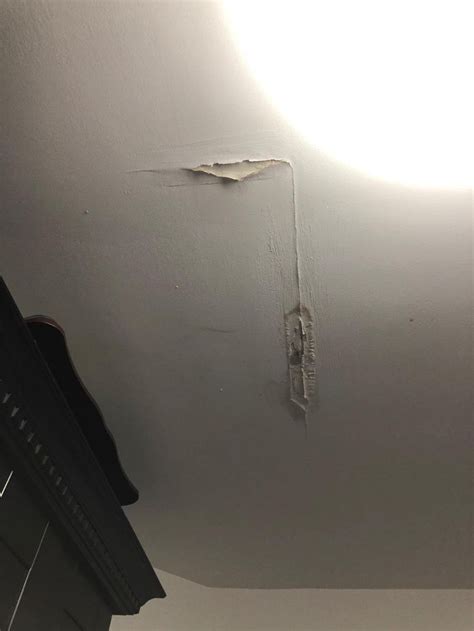 When water leaks from the ceiling, it tends to follow the clearest path until it reaches the lowest point in the ceiling. How do i fix this water damaged kitchen ceiling? Leak from ...