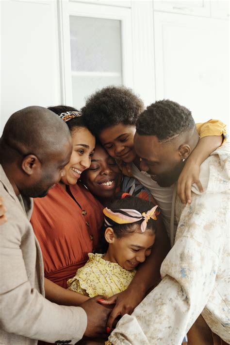 Social activities involving big groups including weddings, receptions, gatherings, retreats, birthday celebrations, kenduri, and more. Family Gathering for a Group Hug · Free Stock Photo