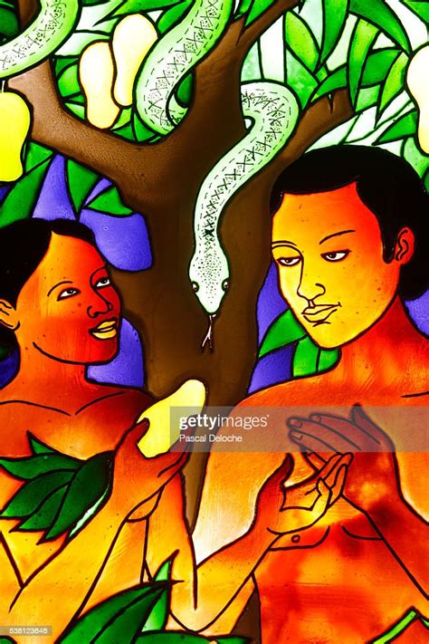 Temptation Of Adam And Eve Stained Glass In Togo High Res Stock Photo