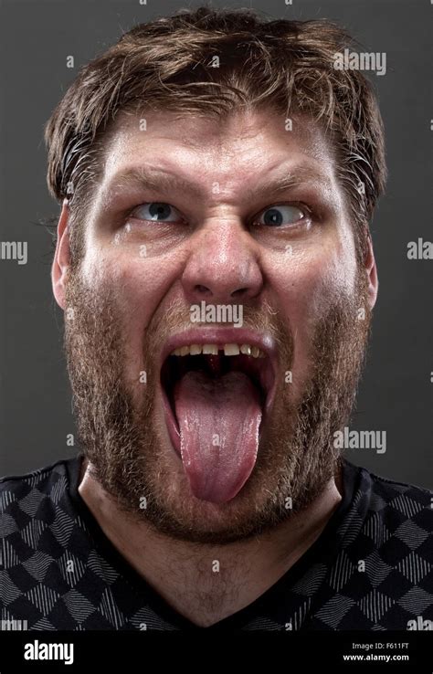 Portrait Of Crazy Man Making Stupid Face Stock Photo Alamy