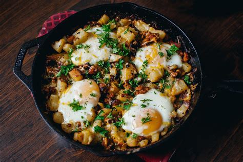 Homemade Potato Sausage Rosemary And Egg Breakfast Skillet Topped