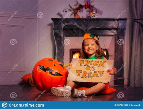 Curious Halloween Girl With Trick Or Treat Sign Stock Image Image Of