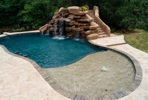 Real Rock Feature With Slide Tanning Ledge With Small Water Feature