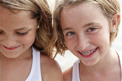 Twin Sisters At The Beach One With Braces By Dina Giangregorio