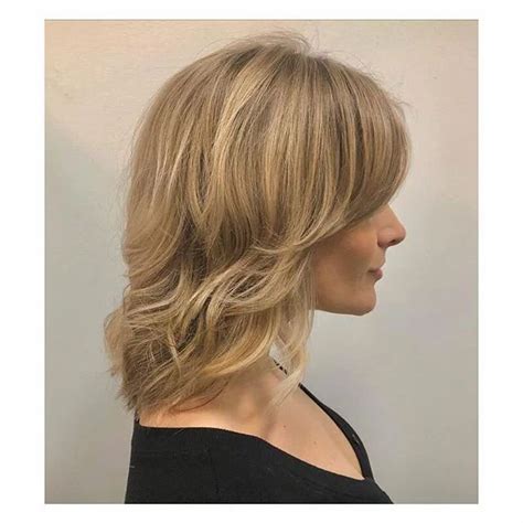 Https://tommynaija.com/hairstyle/dirty Blonde Feathered Hairstyle