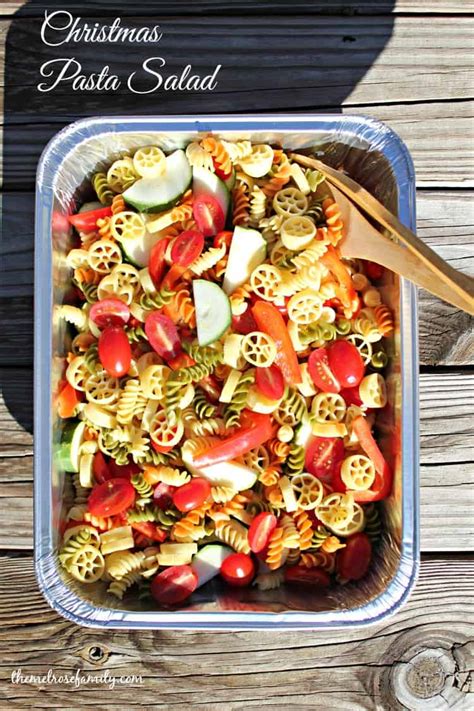 Enjoy this veggie pesto pasta salad with cucumber, peas, cherry tomatoes and basil for an easy family meal. Christmas Pasta Salad - The Melrose Family