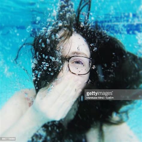 Hold Nose Woman Photos And Premium High Res Pictures Getty Images