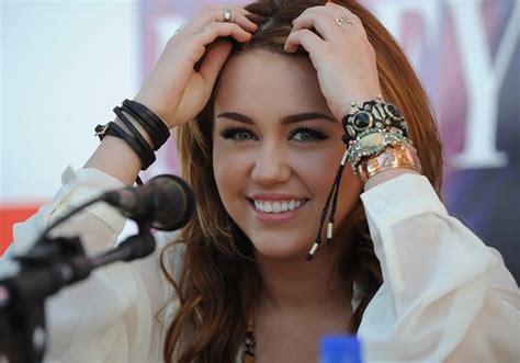 miley cyrus admits old long hair was all extensions capital