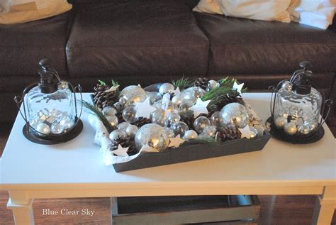 A set of wicker trays…fresh flowers…a touch of pottery and a beautiful glass jar with an elegant silver top. Rustic Maple: Christmas 2013 Living Room Coffee Table Vignette