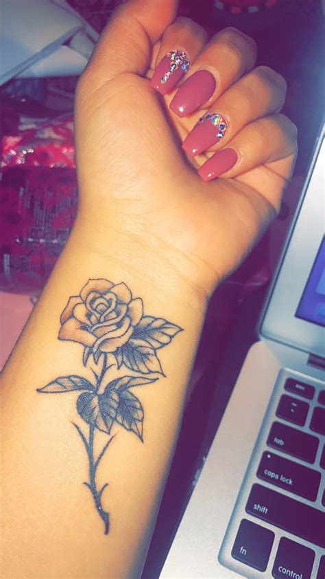 Rose Wrist Tattoo Tattooideasmeaningful Flower Wrist Tattoos Rose