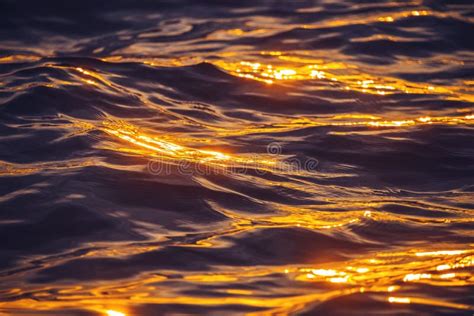 Sea Sunset And Ocean Ripples Waves As Water Texture Background Stock