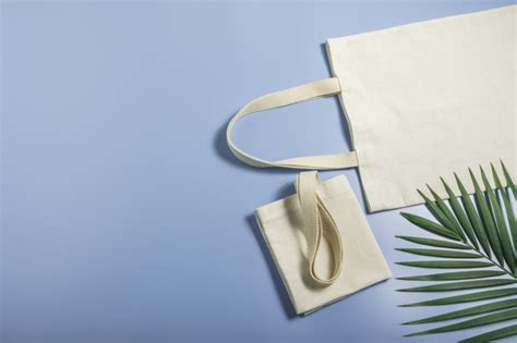 premium photo white tote bag canvas fabric cloth shopping sack mockup  copy space