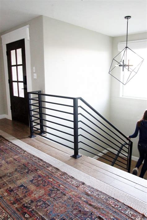 The bars for this modern interior stair railing are hollow and connected to stainless steel posts with plastic inserts. Best 25+ Indoor stair railing ideas on Pinterest | Interior railings, Indoor railing and ...