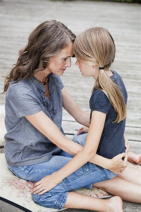 Mother And Daughter Cuddling Stock Image F0039491 Science Photo Library