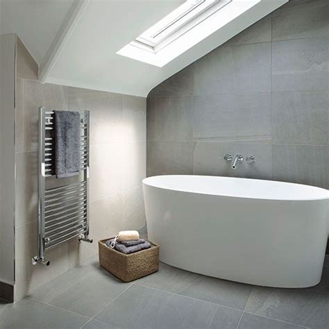 Assign mid grey tiles to your floor, plain cream to three walls and a mix of pebble tones to the fourth. 40 modern gray bathroom tiles ideas and pictures 2020
