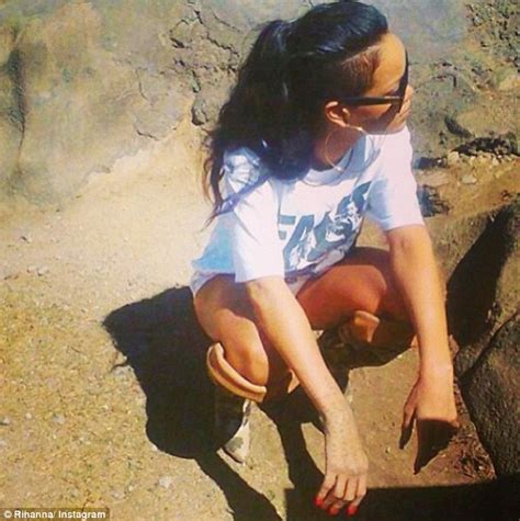 Wild Girl Rihanna Embraces An Elephant As She Continues Her Safari