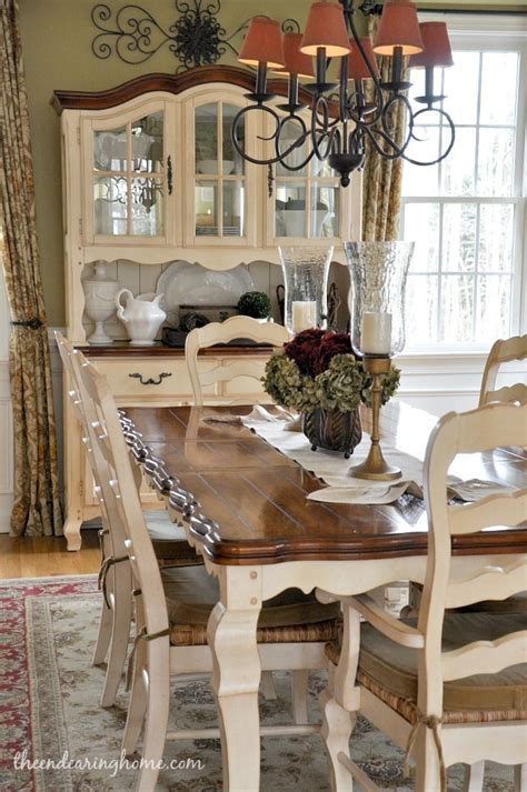 Dark Tabletop With Cream Base And Cream Chairs With Fabric Seat French